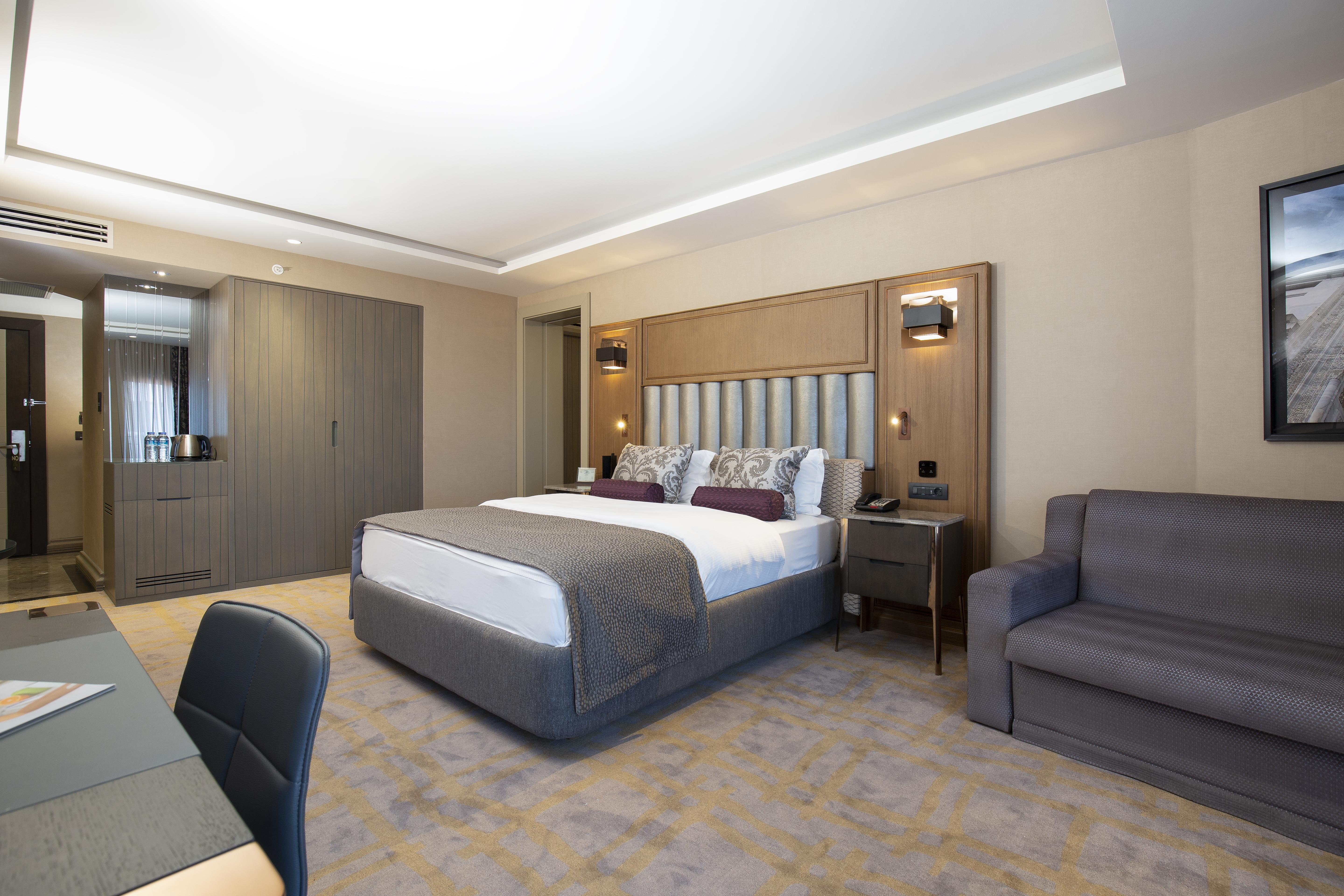 فندق ألميرا بورصة المظهر الخارجي الصورة A bedroom at the hotel
